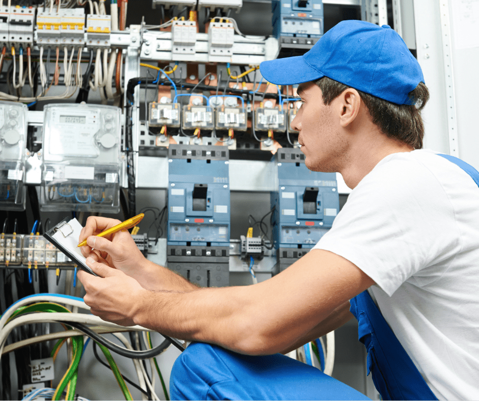 An electrician conducts an electrical inspection