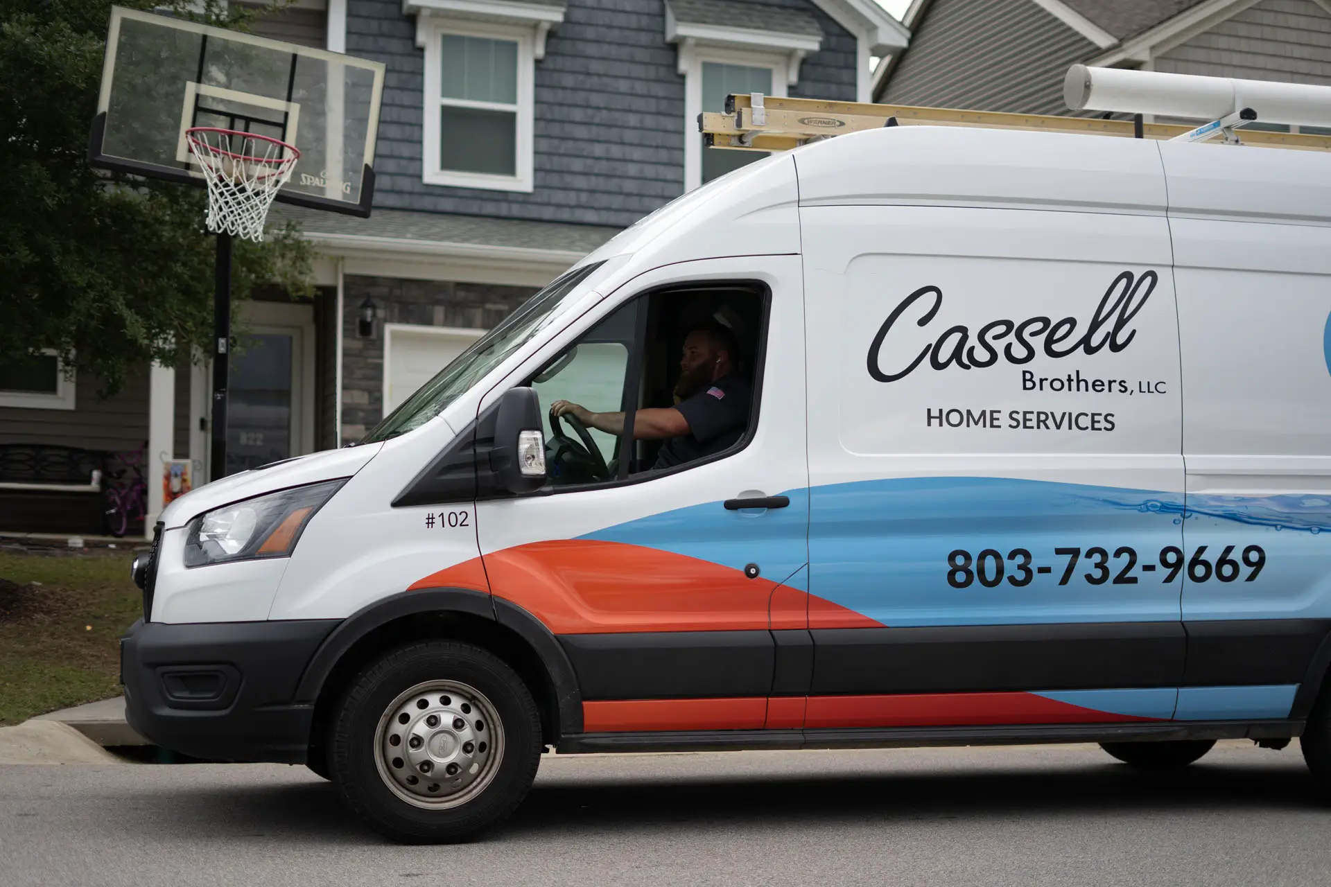cassell brothers home services truck outside customers house